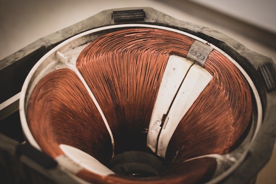 Close-up of copper coil spiral — the core of a magnetic field generator
