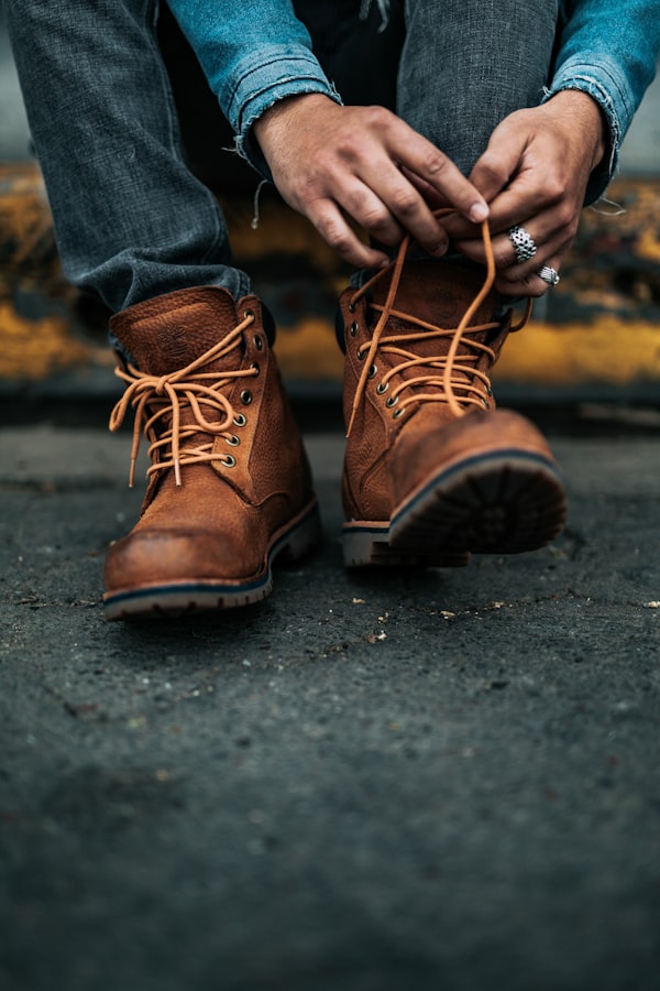 Rugged hiking boots on a rocky mountain trail